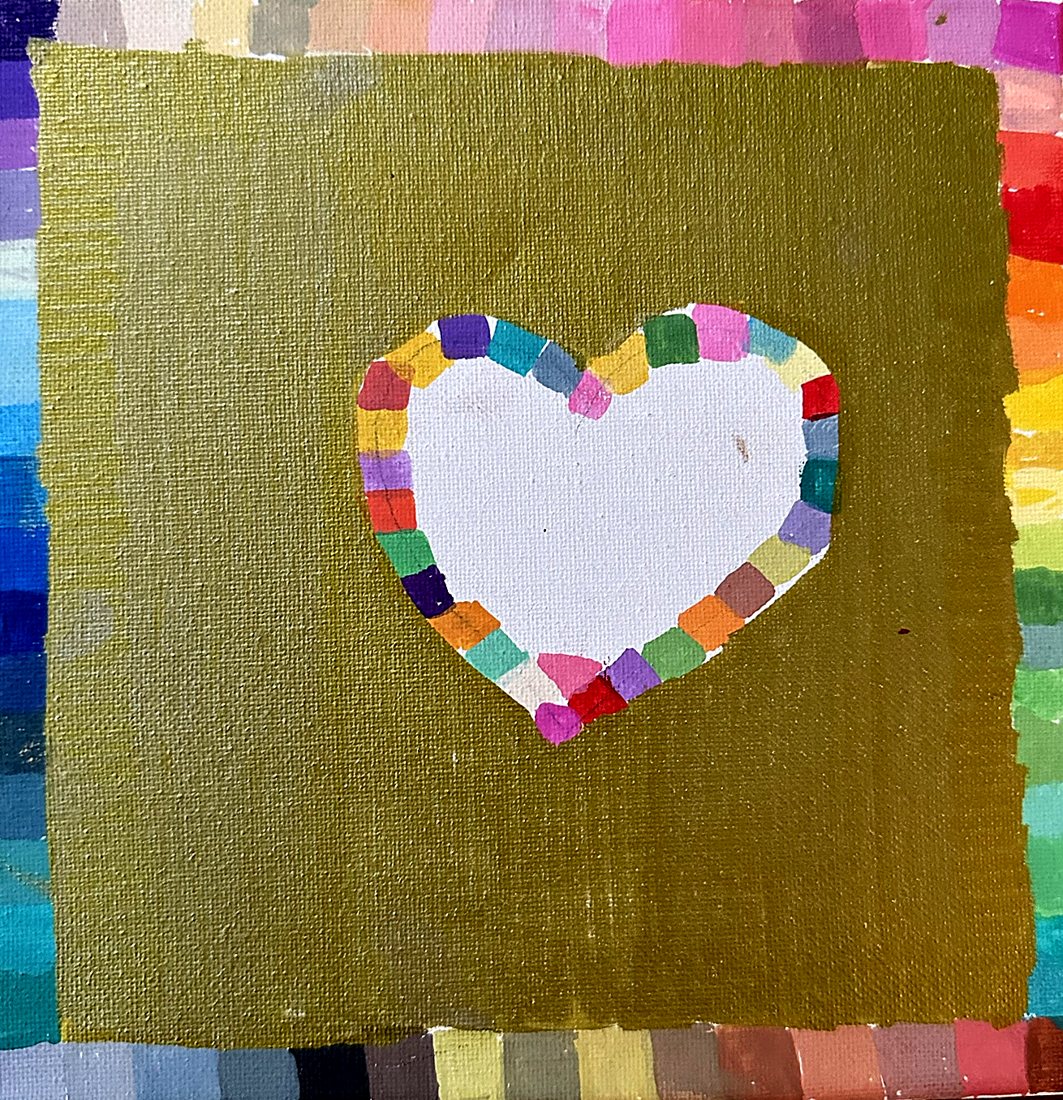 Heart, by Confetti. A white heart edged in colored tiles, on gold, framed by a full spectrum border.