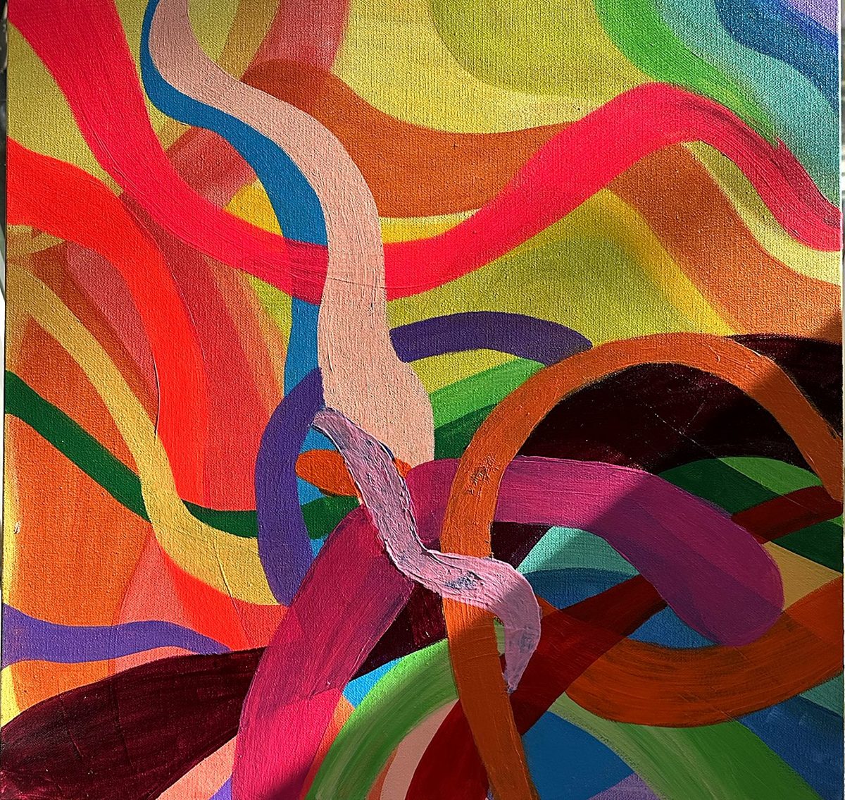 Ribbons. Wide bands of pink, plum, orange and green that loop and knot.